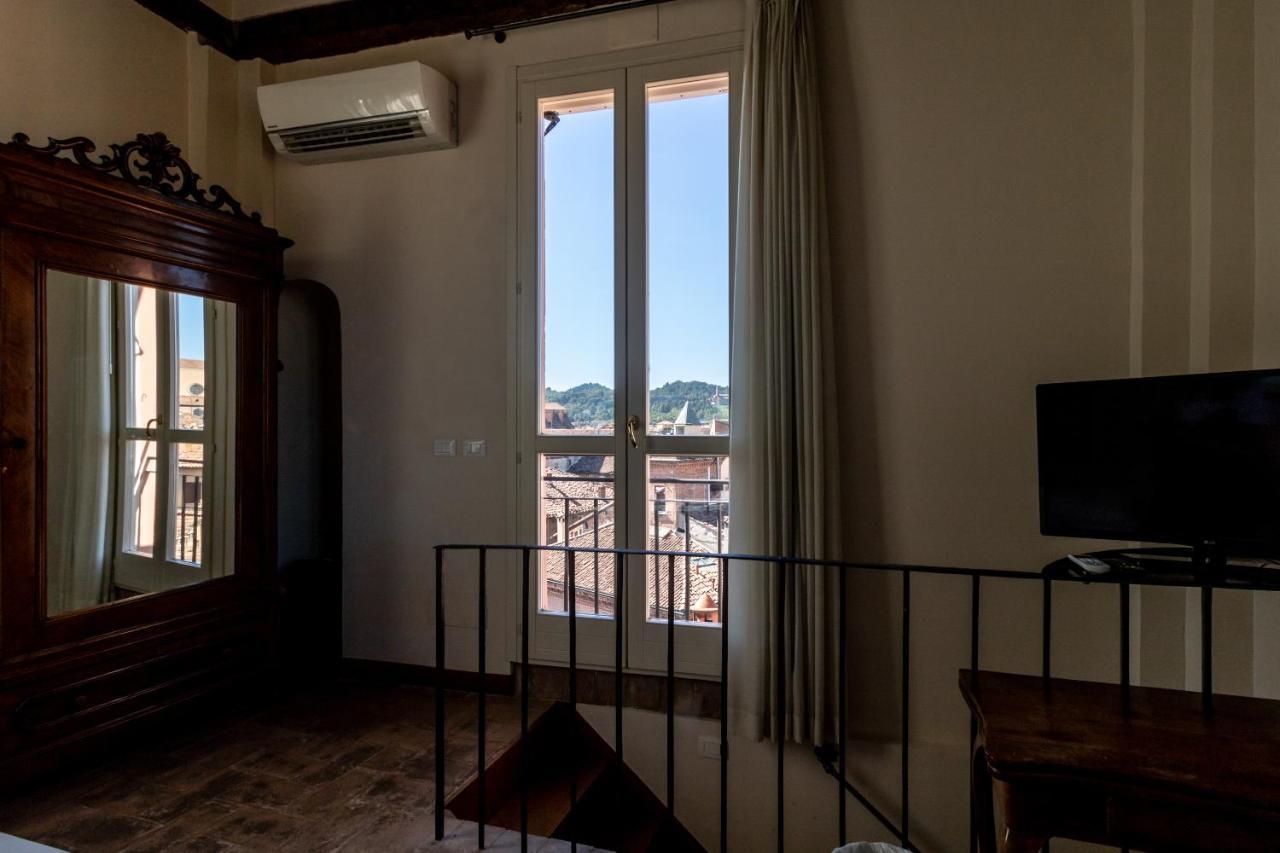 Casa Isolani Charms Rooms Santo Stefano โบโลญญา ภายนอก รูปภาพ